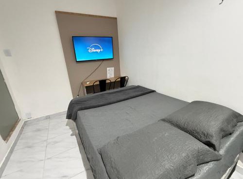 Ap em bairro nobre com garagem e ar