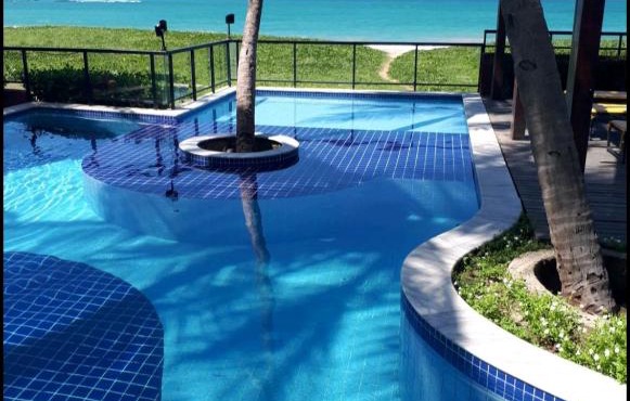 Apartamento beira mar em Guaxuma, pé na areia