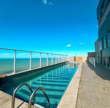 Apartamento com Piscina e Vista Mar ao lado do Itaparica Food Park