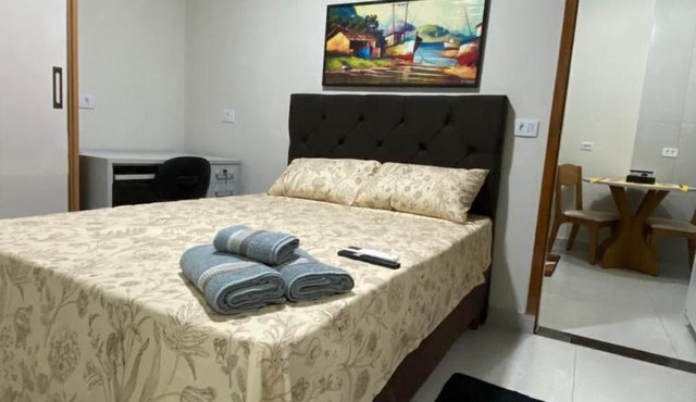 Apartamento compacto de 1 quarto com suíte