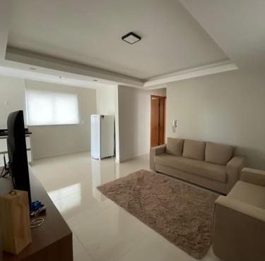 Apartamento em Poços - Varanda com Churrasqueira