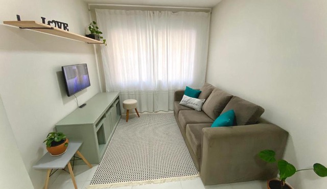 Apartamento no centro, ar-condicionado e garagem