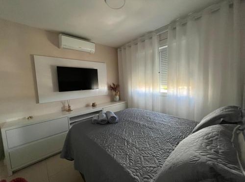 Apartamento suíte com estacionamento