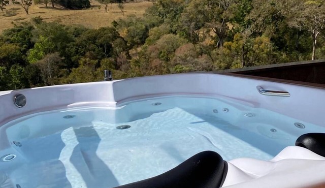 Apartment with hot tub 60 meters from natural pools with waterfalls.