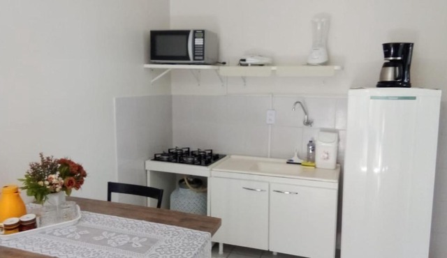 Apto 10: sala/cozinha,1quarto(ar e 2 camas)c/garag