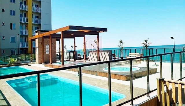 Apto c churrasq e piscina a beira-mar - Itajuba-SC