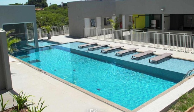 Apto com piscina | Suíte, ar e escritório