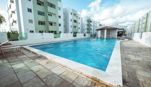 Apto com WiFi e piscina em localização estratégica