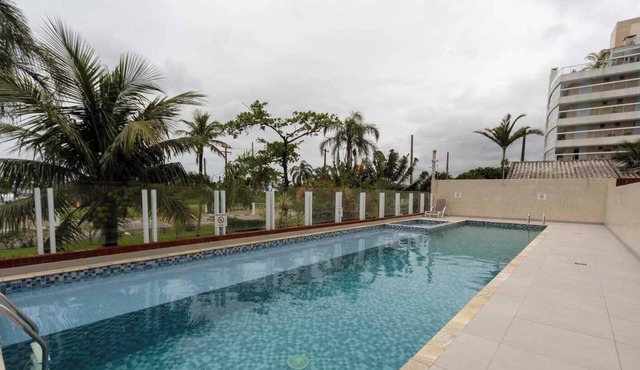 Apto em Bertioga a beira mar com varanda gourmet