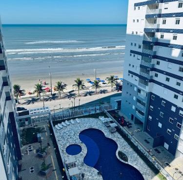 Apto frente o mar com 3 piscinas Wi-Fi gratuito aceito pet