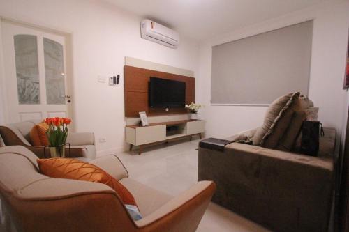 Apto32-Encantador -2 quartos- em Santos-SP com ar condicionado