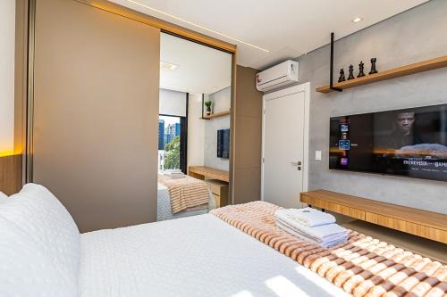 Batel Garage Queen Bed & 2 Smart TVs