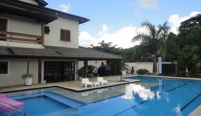 Beach house with large swimming pool, jacuzzi, court, squash and 9 bedrooms.