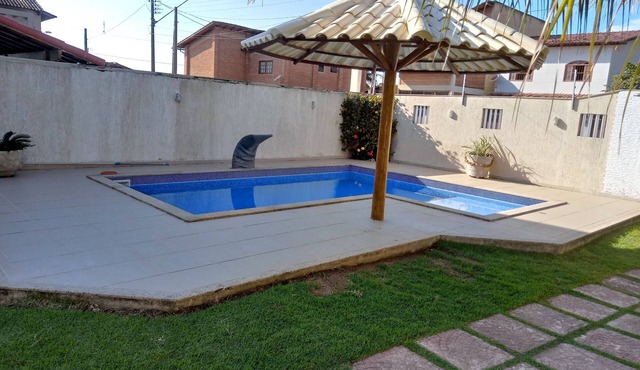 Beach house with swimming pool, sea view, backyard and barbecue area