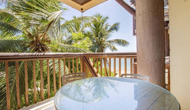 Beachfront Apartment in a Condo with Balcony