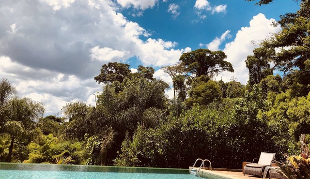 Beautiful estate with swimming pool, tennis court, sauna, gardens, lakes and native forest