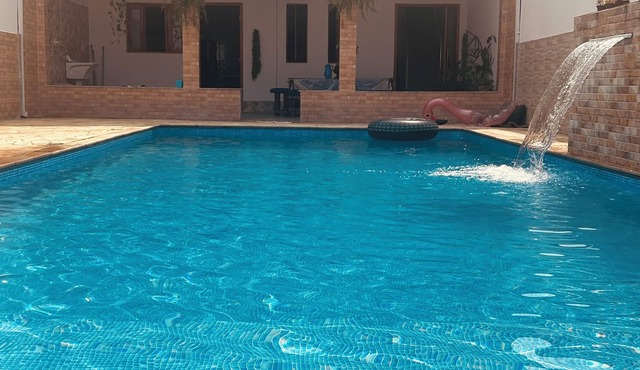 Country house with pool/jacuzzi and barbecue💜 near Campos do Jordão