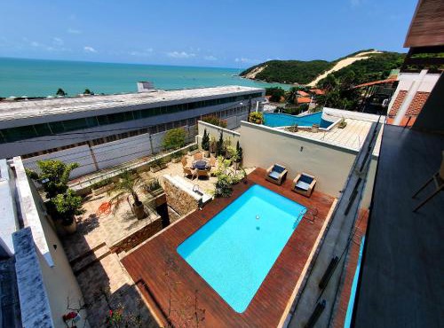 Casa Áurea! A 100 metros da areia de Ponta Negra, com vista deslumbrante do mar