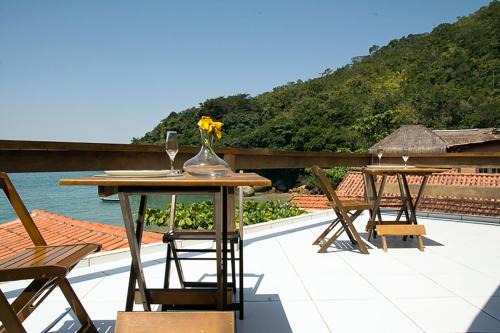 Casa 1 - Você a Varanda e o Mar na Praia dos Ranchos-Trindade Hospeda