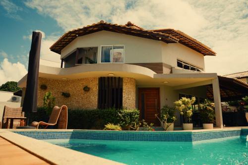 Casa 5 suites a 3 minuntos andando para o mar