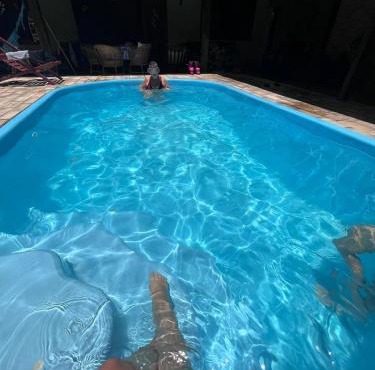 Casa com área de lazer em Xerém