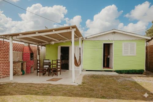 Casa com Churrasqueira, Quintal, Ar Cond e Garagem