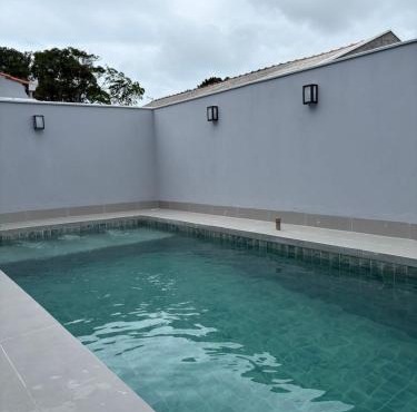 Casa com piscina praia do ervino