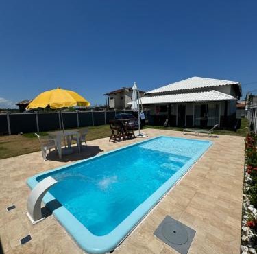 Casa com Piscina,Area gourmet,3 quartos,espaço Kids