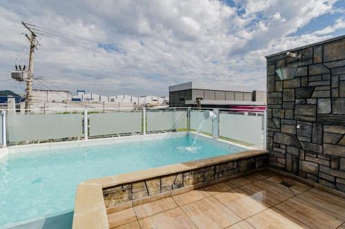 Casa com Piscina Churrasqueira e Ar Condicionado