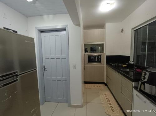 Casa com tres quartos e garagem