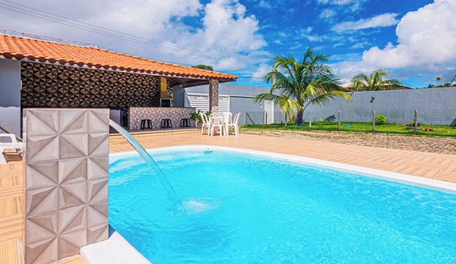 Casa com WiFi, churrasqueira e ótima localização
