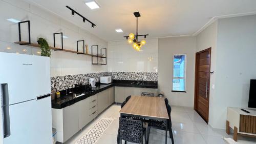 Casa confortável com ar no litoral