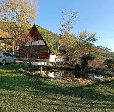 Casa da cachoeira, Hidro,lareira,lago, riacho e fogo de chão