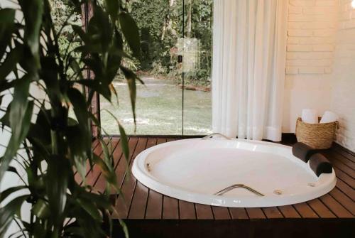 Casa de campo em Joinville com Hidro e lareira