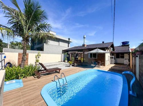 CASA GOLFINHO 348 - casa com piscina e lazer para até 8 pessoas