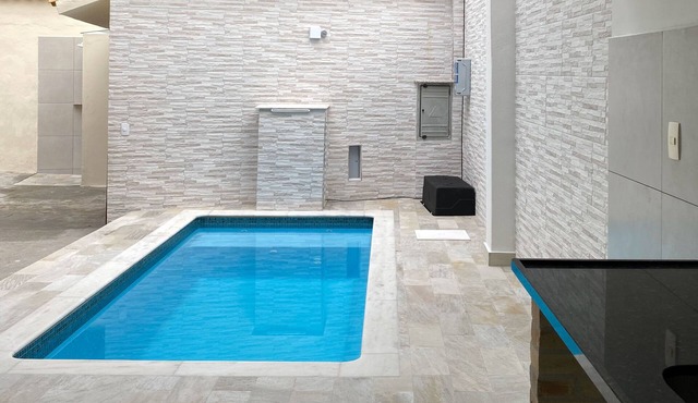 Casa inteira, 4 dormitórios, ar condicionado, piscina próximo da praia