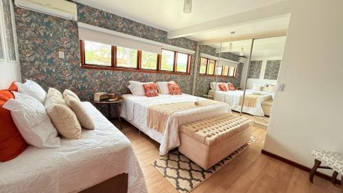 Casa Jurere Internacional com 6 quartos e piscina, churrasqueira , 300m do mar