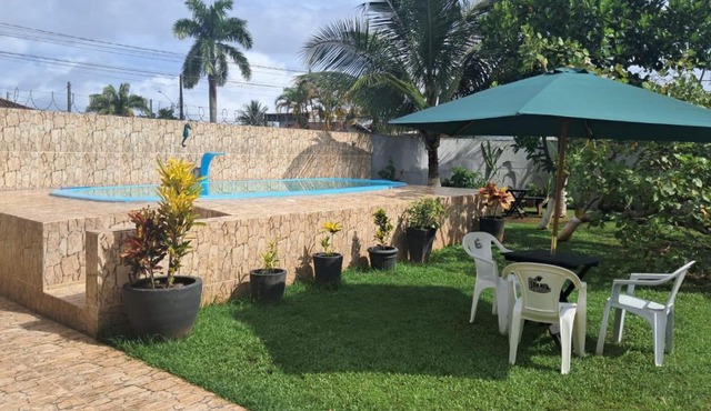casa perto da praia, clima bom para descansar.