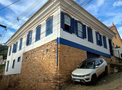 CASA RAIZ cama café e prosa