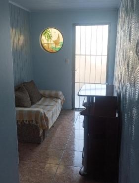 Casa simples e arejada