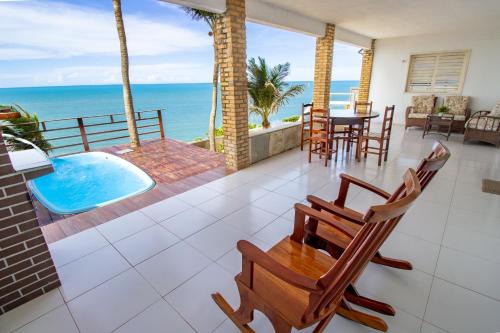 Casa Vista ao Mar - Paisagem Deslumbrante e Localização Perfeita