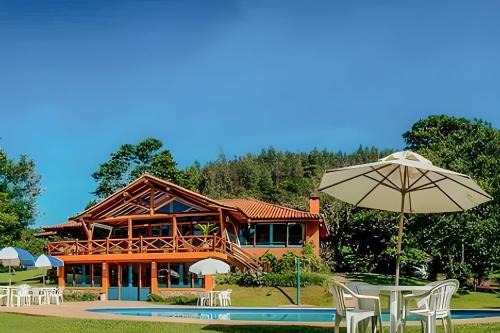 Chalé p/família com lareira, sauna e piscina