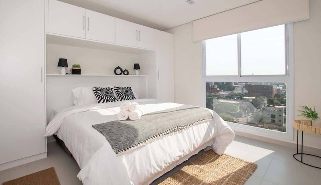 Cityscape Views - New 2BR Retreat
