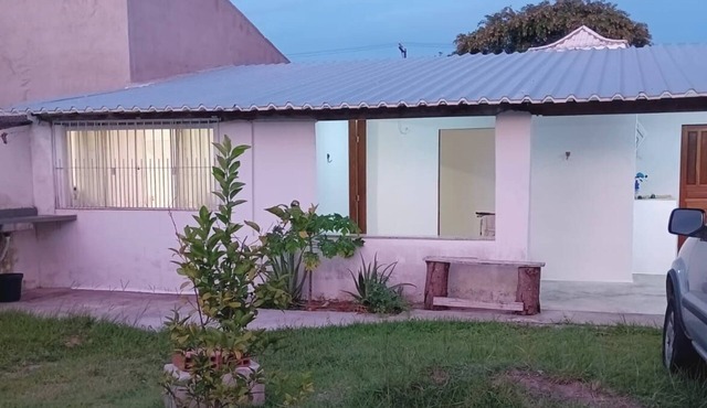 Contact with nature in the House/Yard, in the midst of urban practicality.
