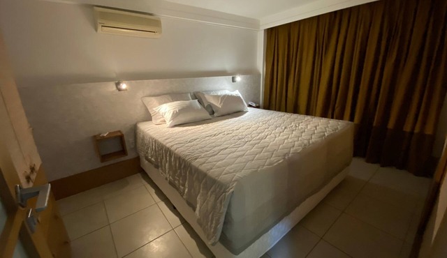 Cozy apartment with a beautiful view of the sea and Morro do Careca.