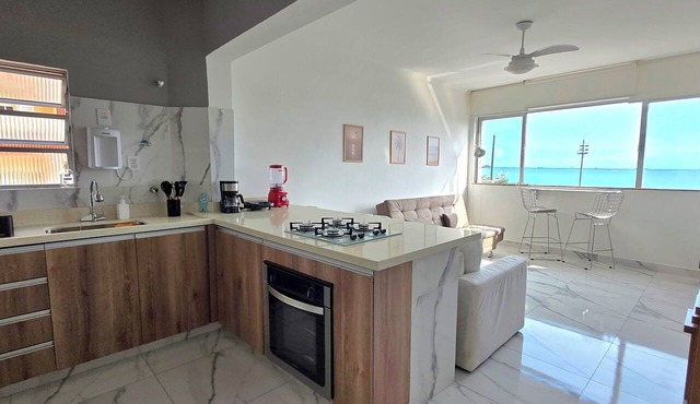 Cozy beachfront apartment in Embaré, pets allowed.