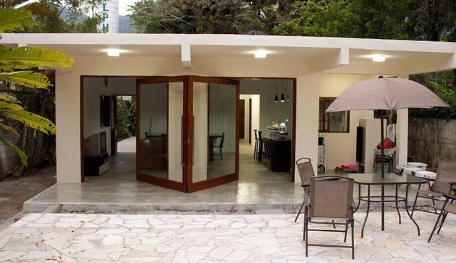 Cozy beachfront house with pool, terrace, barbecue, and Wi-Fi.