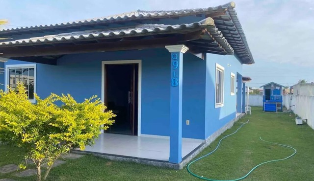 Cozy house with swimming pool in condominium with lagoon.