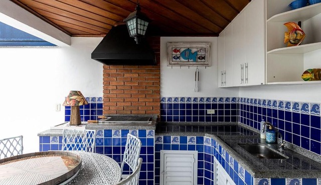 Duplex com piscina e área gourmet perto da praia