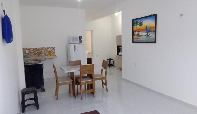 Estrela Apartamento 2 terreo - Quarto e sala com cozinha americana na praia do prea-Ce